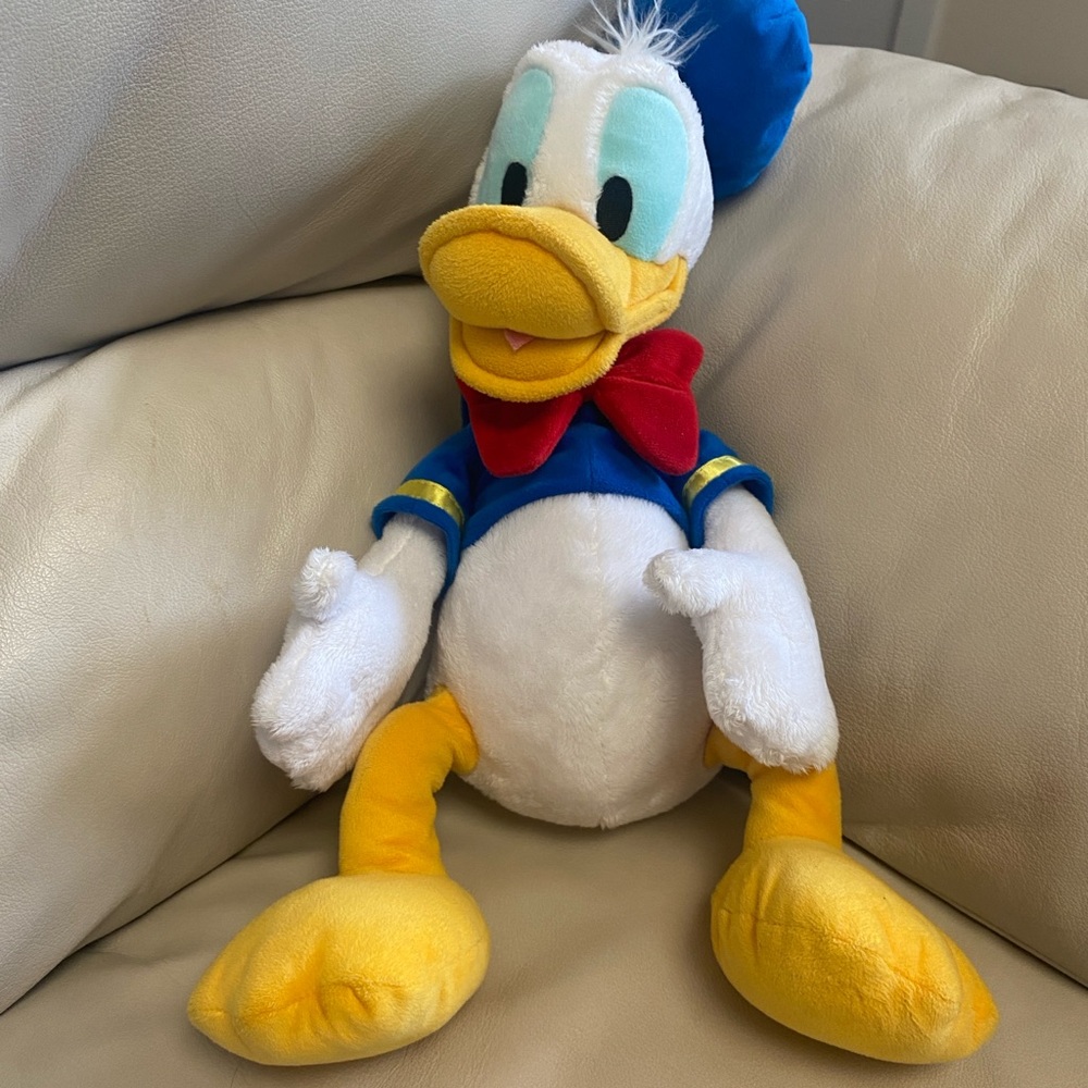 Donald Duck Toy with Blue Hat and Red Bow